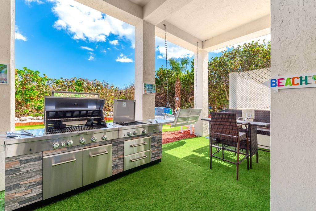 Stainless steel barbecue summer kitchen in recreation area